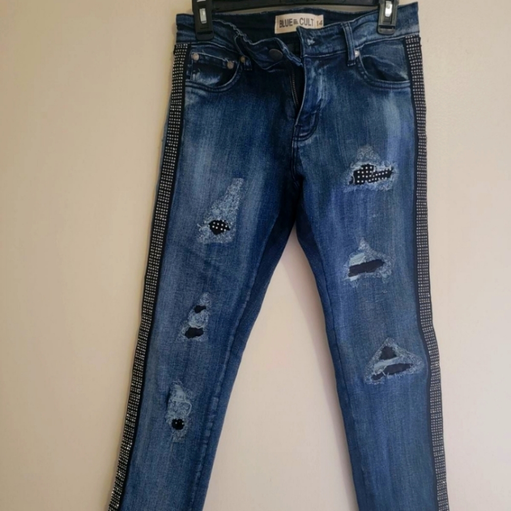 Blue Colt brand jeans with diamond studs down each leg. Super cute. Studs on rip